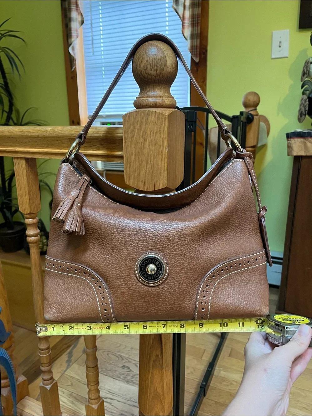 Dooney & Bourke Camel Brown Pebbled Leather Shoulder Bag with Tassel Emblem